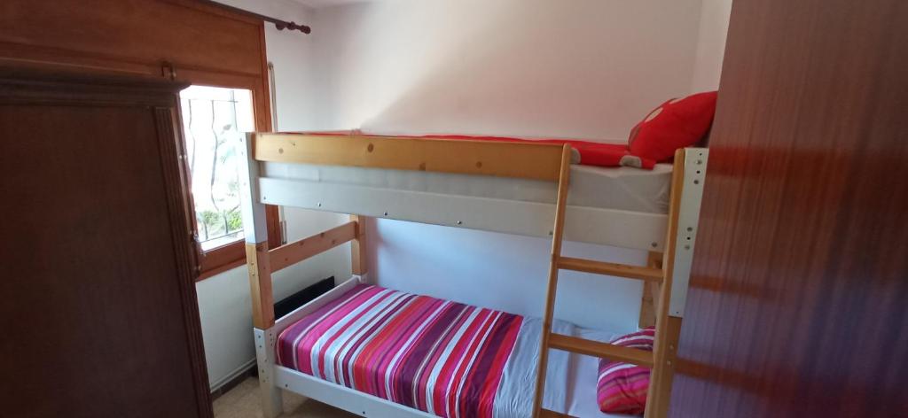 Posteľ alebo postele v izbe v ubytovaní Gira-sol villa