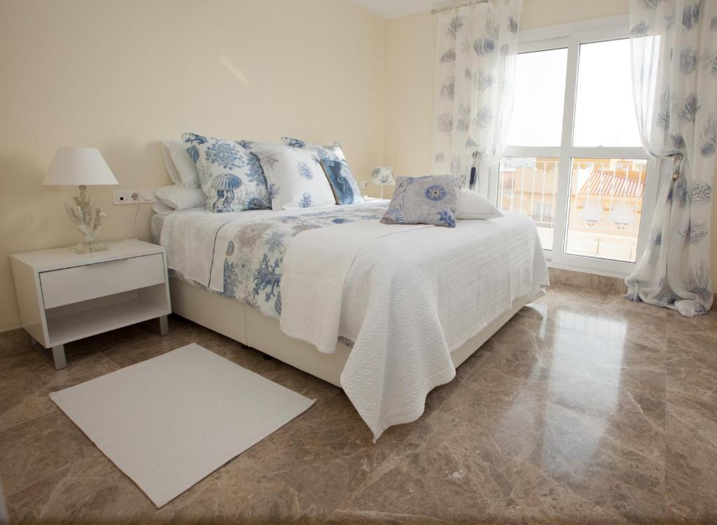Posteľ alebo postele v izbe v ubytovaní Almerimar Porto Fino - Appartement de luxe, vue mer