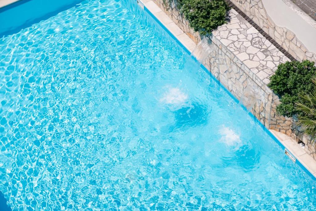 Bazén v ubytování Hotel Royal nebo v jeho okolí