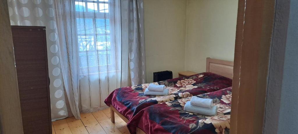 Postel nebo postele na pokoji v ubytování Guesthouse Robi