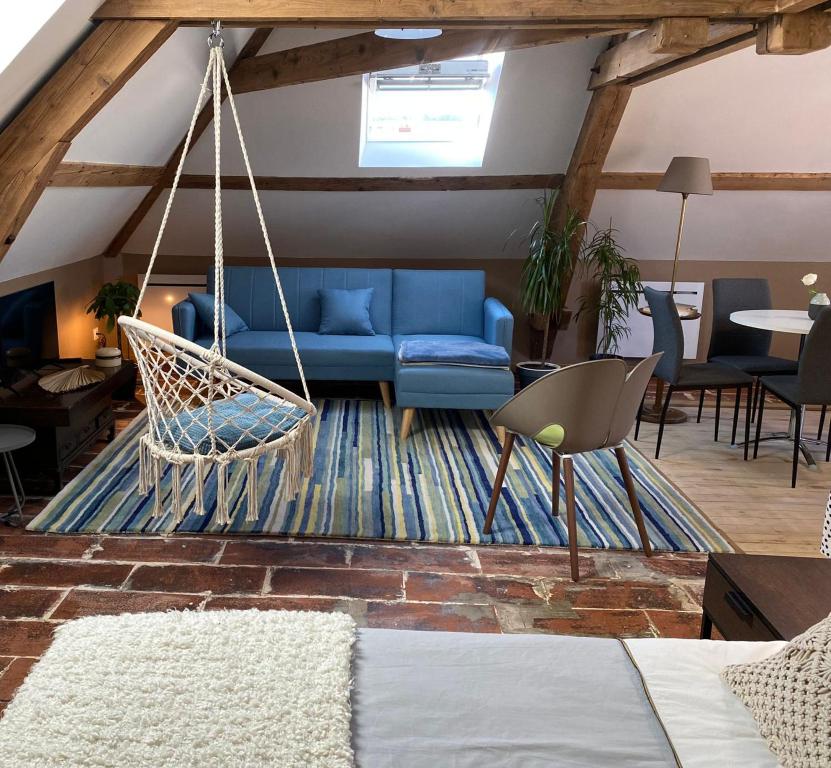 Posezení v ubytování Appartements CDG JOIGNY