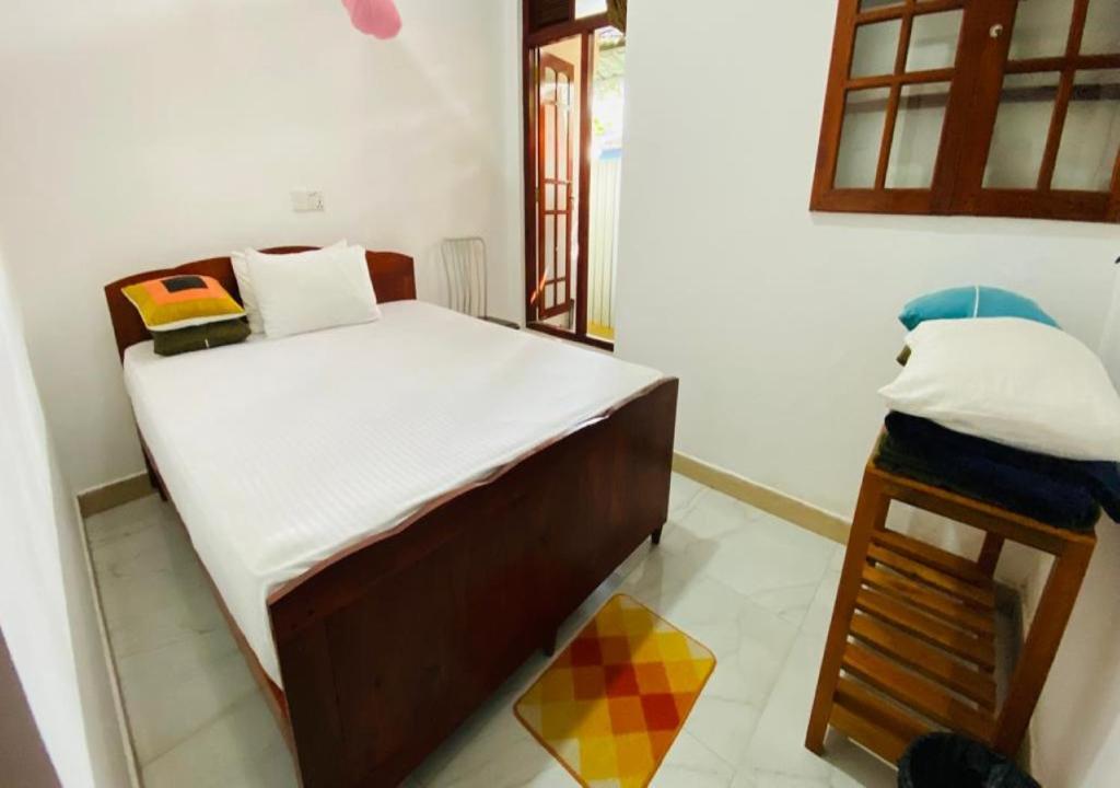 Postel nebo postele na pokoji v ubytování Daban Homestay Ella