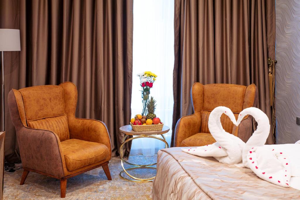 Posezení v ubytování Al Mansour Plaza Hotel