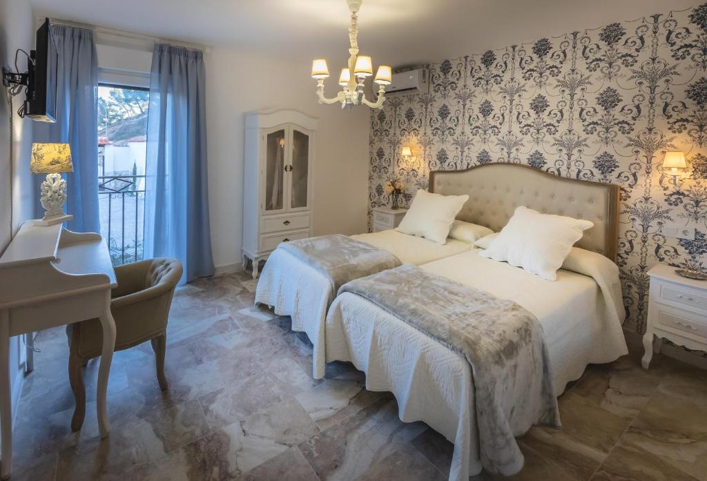 Postel nebo postele na pokoji v ubytování Casa Rural Majada del Conde