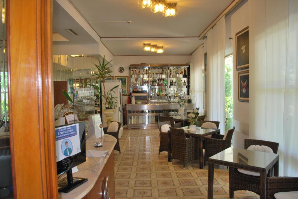TV a/nebo společenská místnost v ubytování Hotel Villa Verde
