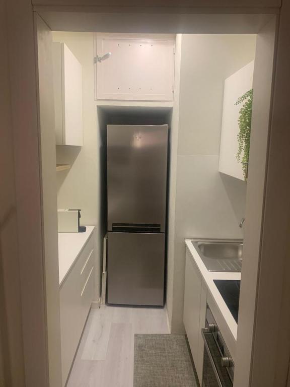 A kitchen or kitchenette at The secret window on the river Arno