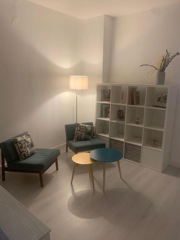 A seating area at The secret window on the river Arno