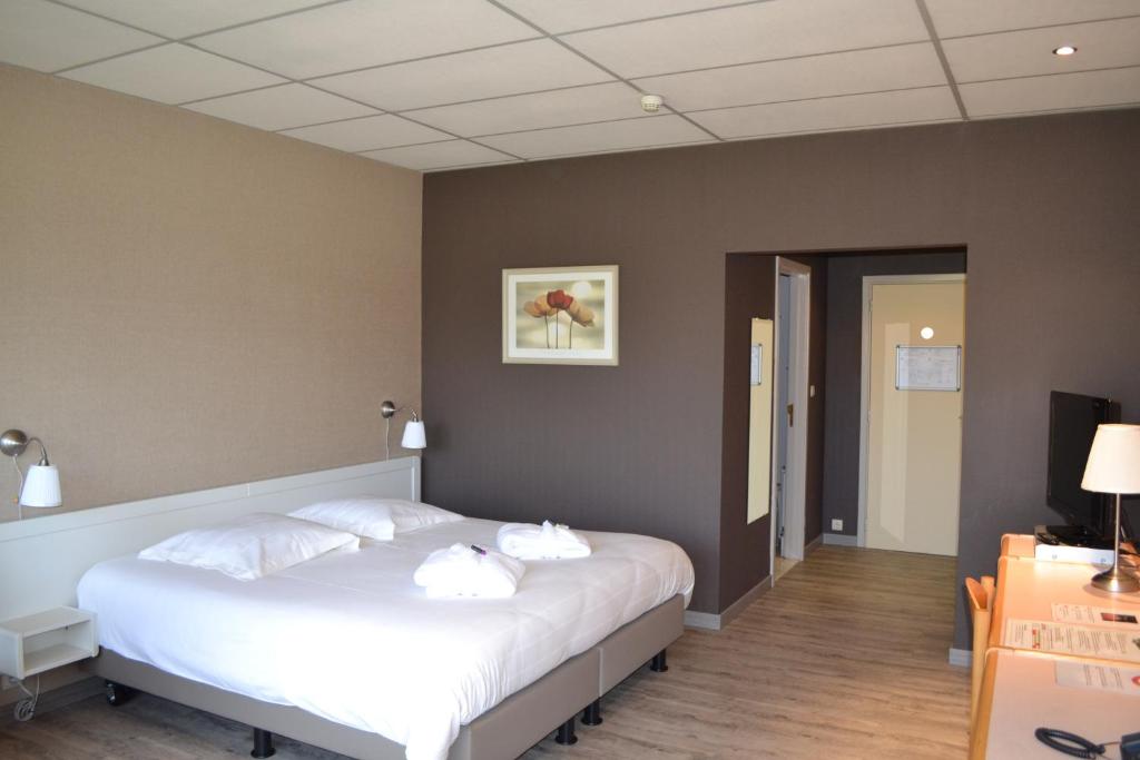 Postel nebo postele na pokoji v ubytování Le Relais De La Haute Sambre