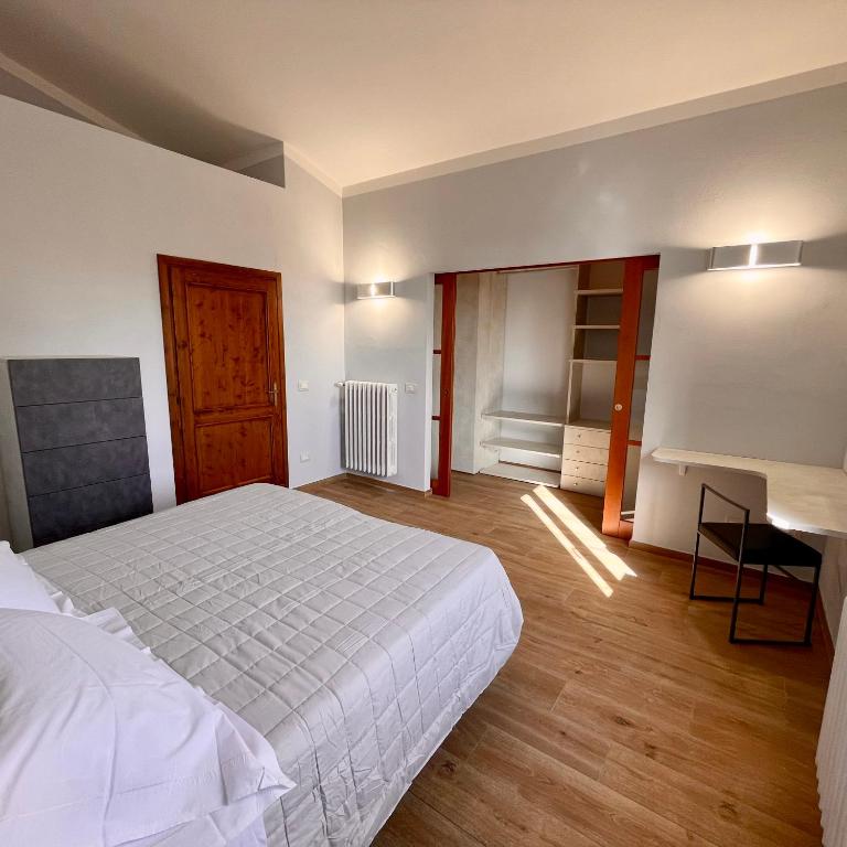 Postel nebo postele na pokoji v ubytování Bed & Breakfast Montepulciano