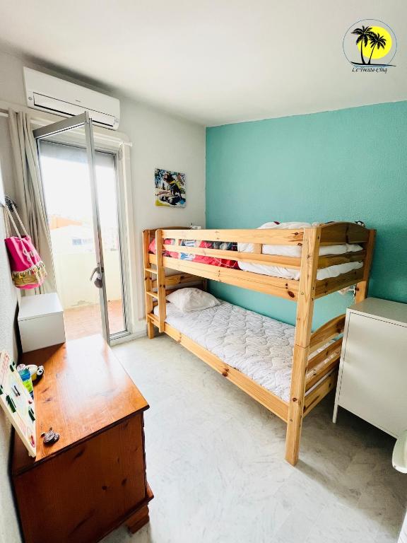 Posteľ alebo postele v izbe v ubytovaní T4 Le Trente Cinq 3 chambres & climatisation