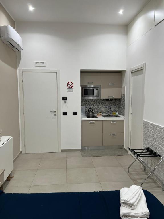 Kuchyňa alebo kuchynka v ubytovaní Room25mq