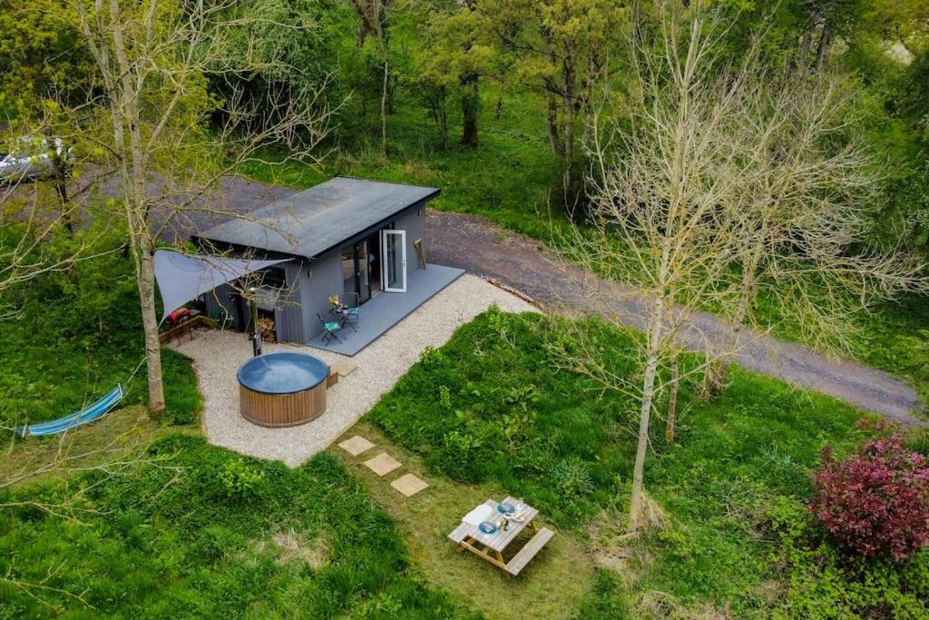 an overhead view of a tiny house in the woods at Lakeside Eco Lodge- 'Heron' in Bishampton