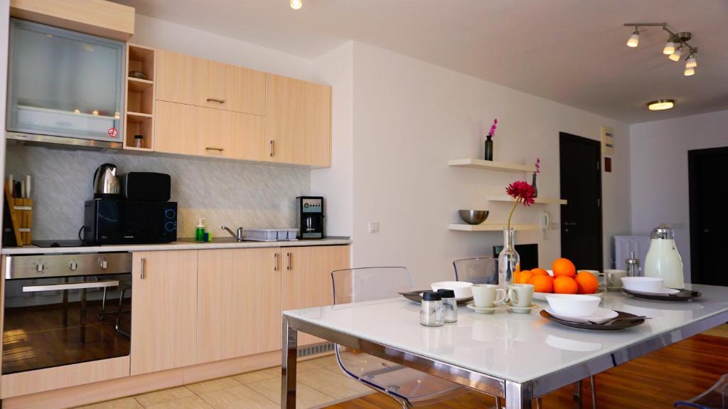 A kitchen or kitchenette at Byala Cliff Sea View Penthouse