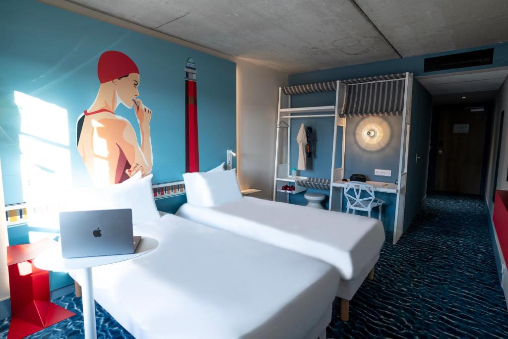 Postel nebo postele na pokoji v ubytování Ibis Styles Le Touquet