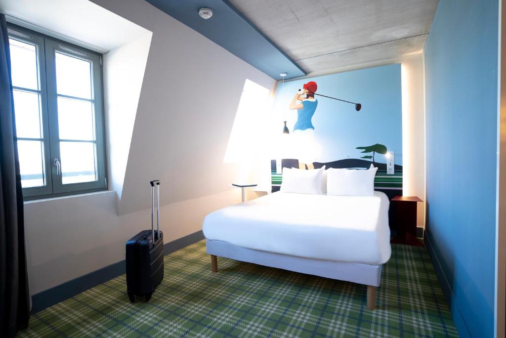 Postel nebo postele na pokoji v ubytování Ibis Styles Le Touquet