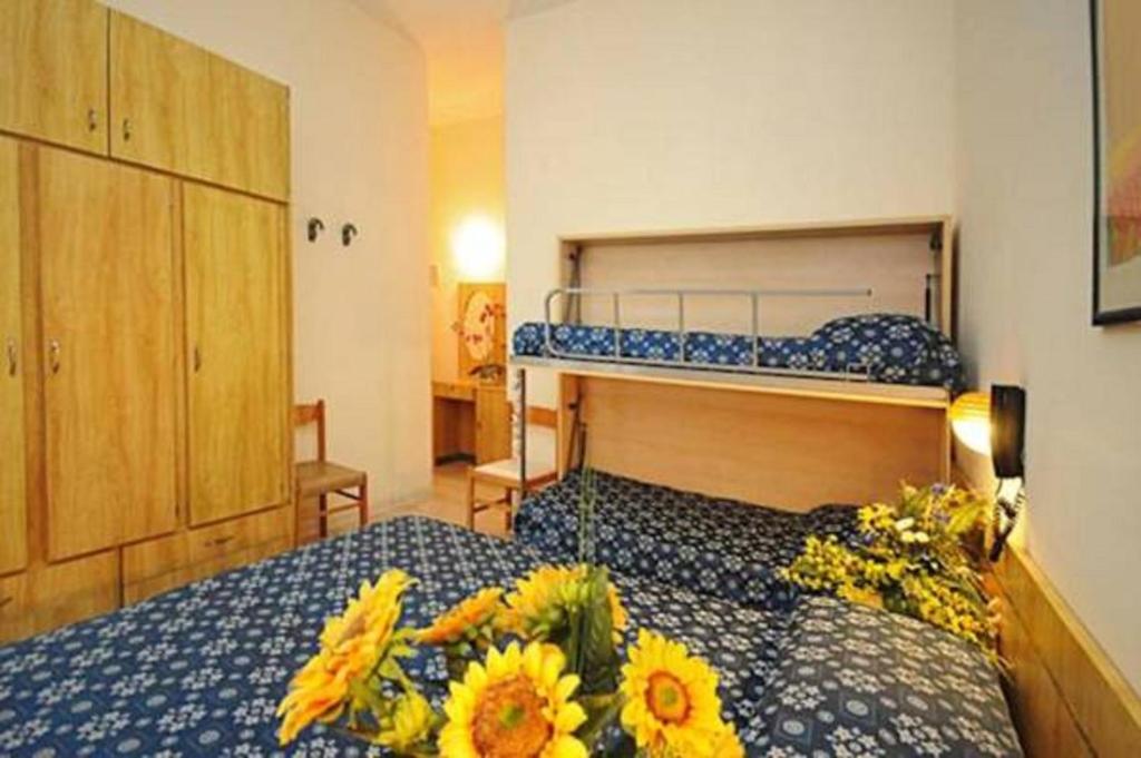 Postel nebo postele na pokoji v ubytování Hotel Marina