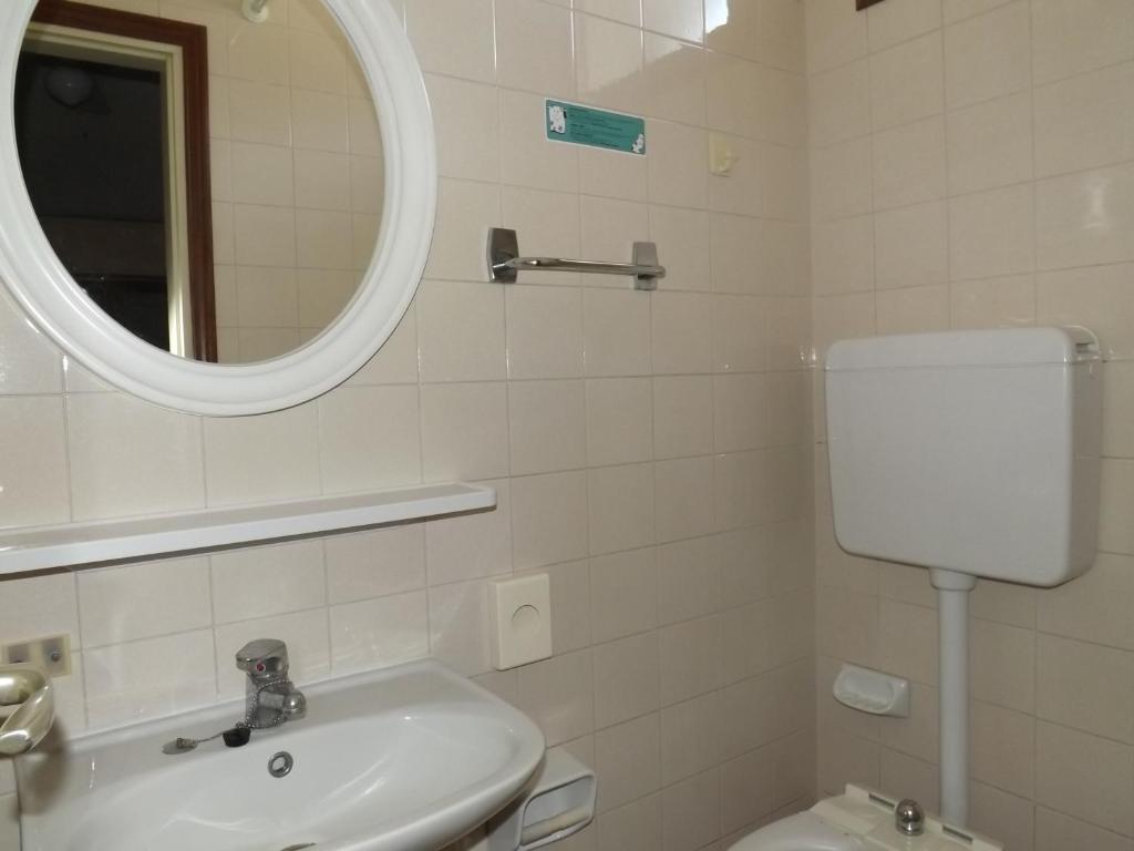 Koupelna v ubytování Hotel Marina