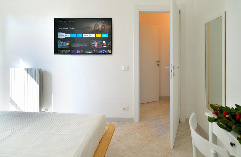 TV a/nebo společenská místnost v ubytování a CASA IDA