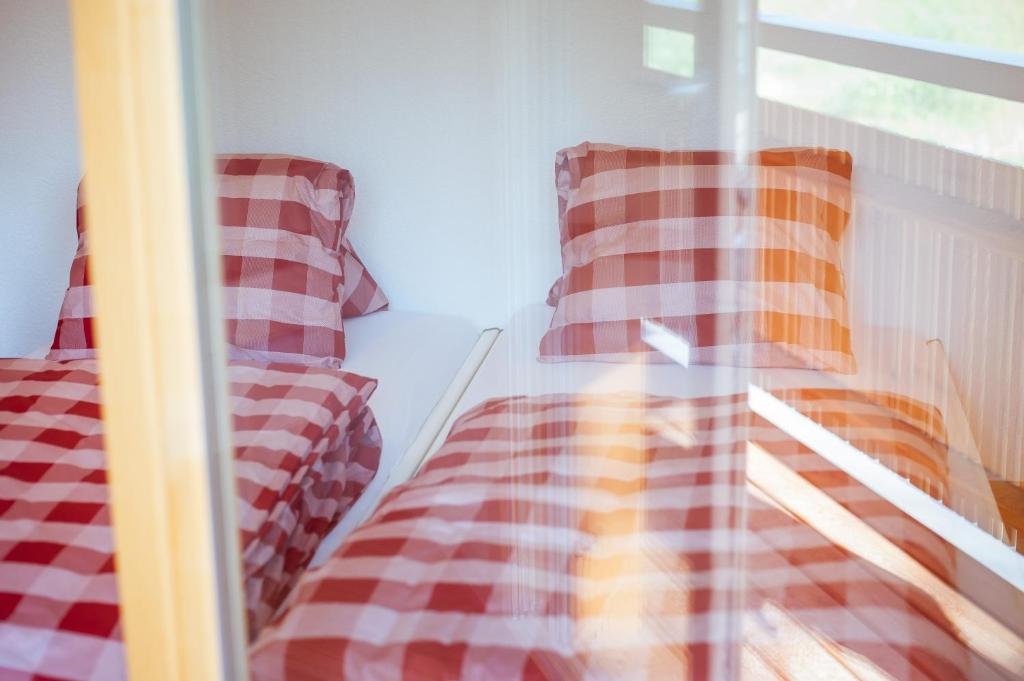 Postel nebo postele na pokoji v ubytování Campingplatz Mittagsspitze