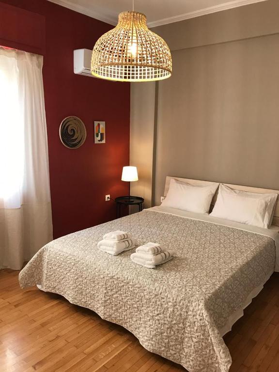 Posteľ alebo postele v izbe v ubytovaní Kanigos 3 BR VIEW Center of Athens