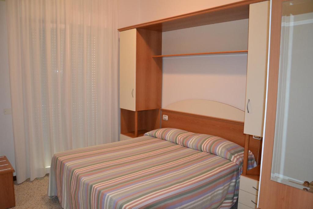 Postel nebo postele na pokoji v ubytování Hotel Ariston