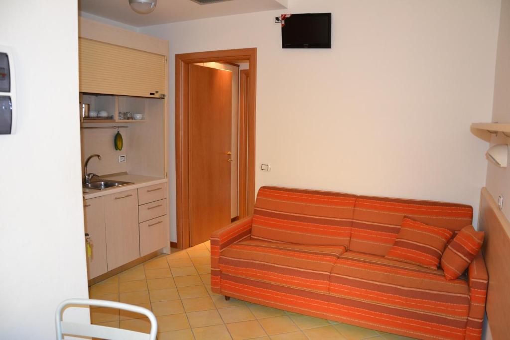 Kuchyň nebo kuchyňský kout v ubytování Hotel Ariston