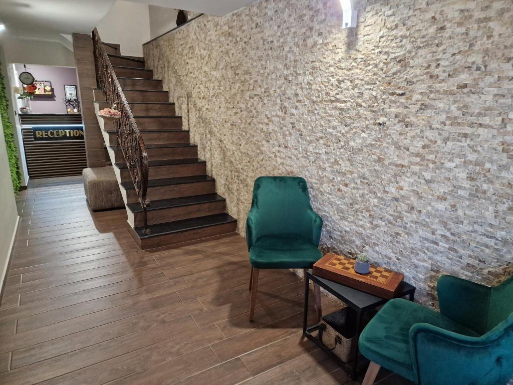 Posezení v ubytování Kamelia guest rooms