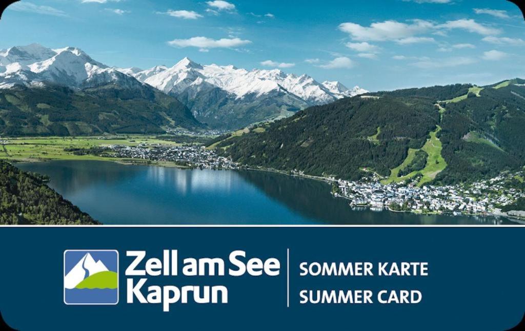 a picture of a lake with mountains in the background at Areit Apartments - Low Budget in Zell am See