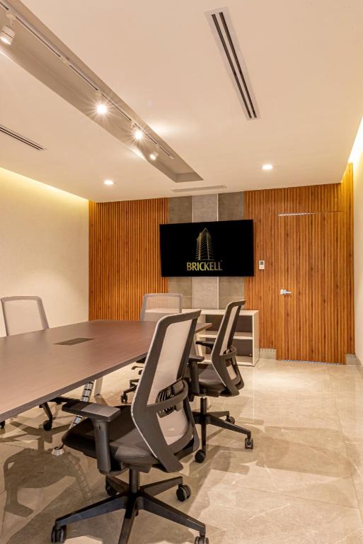 TV a/nebo společenská místnost v ubytování Brickell Apart Hotel