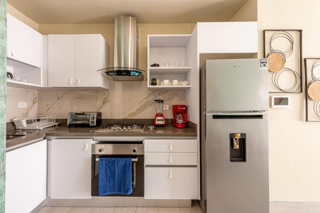 Kuchyň nebo kuchyňský kout v ubytování Brickell Apart Hotel