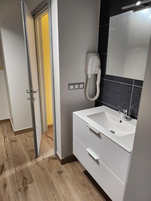 Koupelna v ubytování Chambres Jura Sud