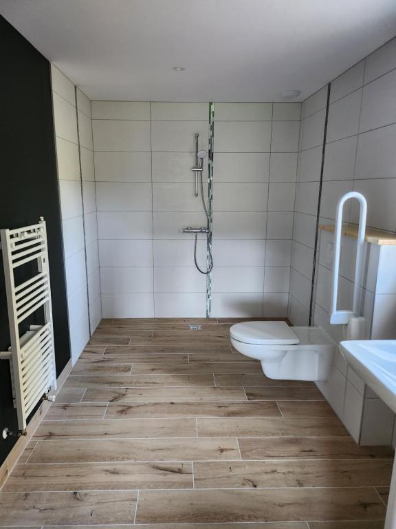 Koupelna v ubytování Chambres Jura Sud