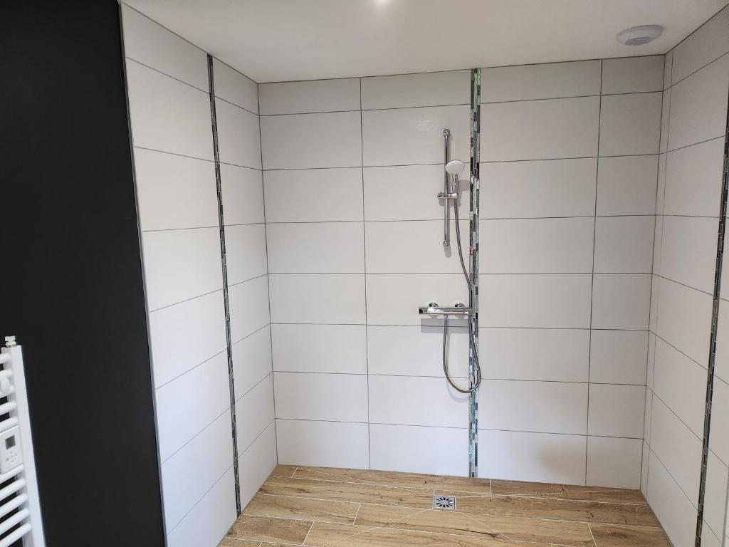Koupelna v ubytování Chambres Jura Sud