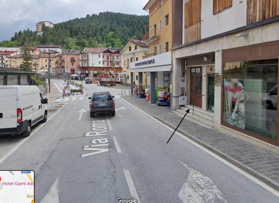 a car driving down a street in a town at Il rifugio del Bracconiere in Roccaraso