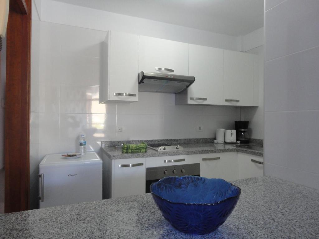 Kuchyň nebo kuchyňský kout v ubytování Apartamentos Quintero – Adults Only