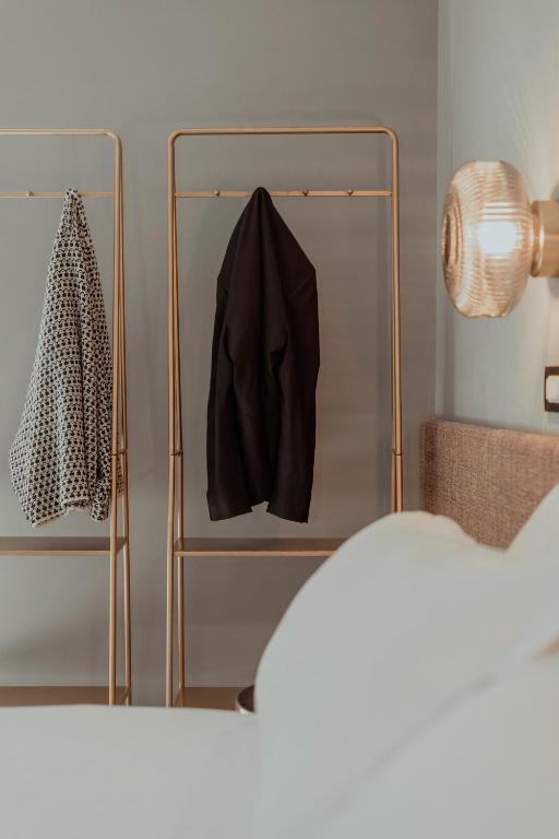 Postel nebo postele na pokoji v ubytování Hotel Marisa