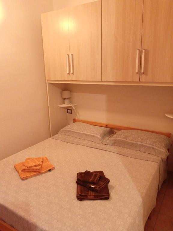 Łóżko lub łóżka w pokoju w obiekcie Bed and Breakfast Stefania