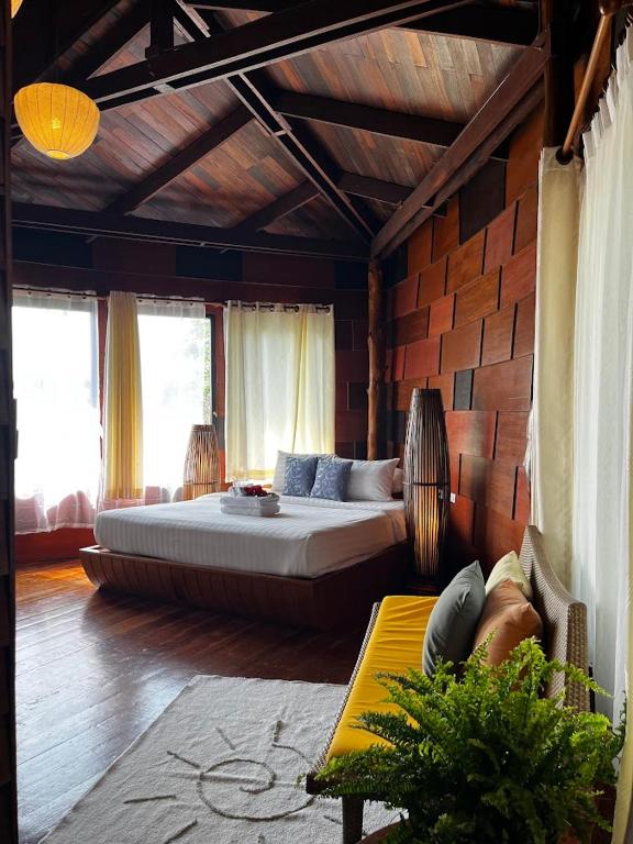 Ein Bett oder Betten in einem Zimmer der Unterkunft Green Papaya Beach Resort, Koh Phangan