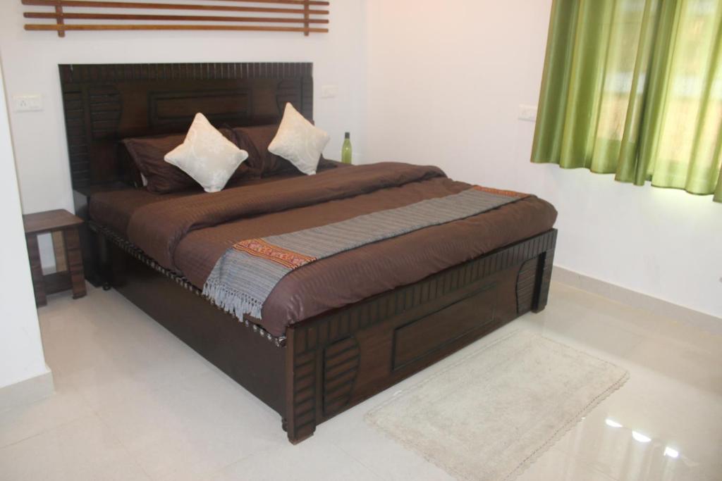 Postel nebo postele na pokoji v ubytování RATTAN HOUSE