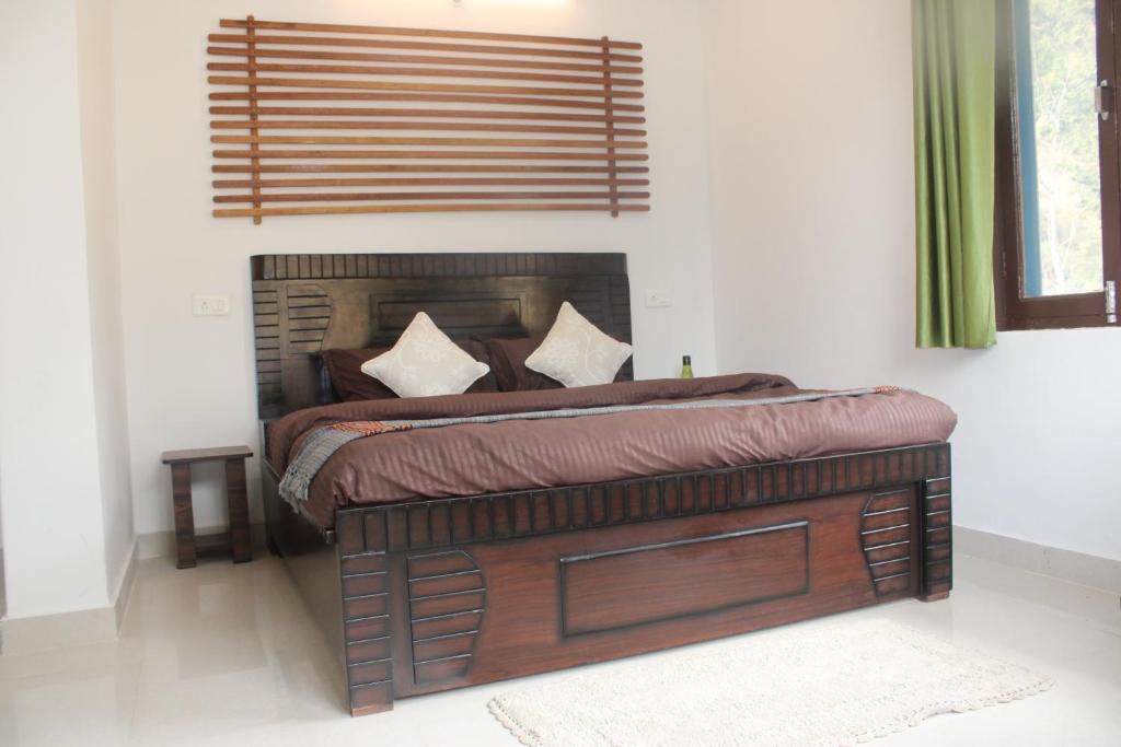 Postel nebo postele na pokoji v ubytování RATTAN HOUSE
