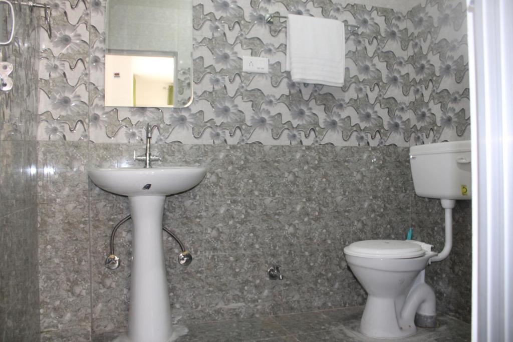 Koupelna v ubytování RATTAN HOUSE