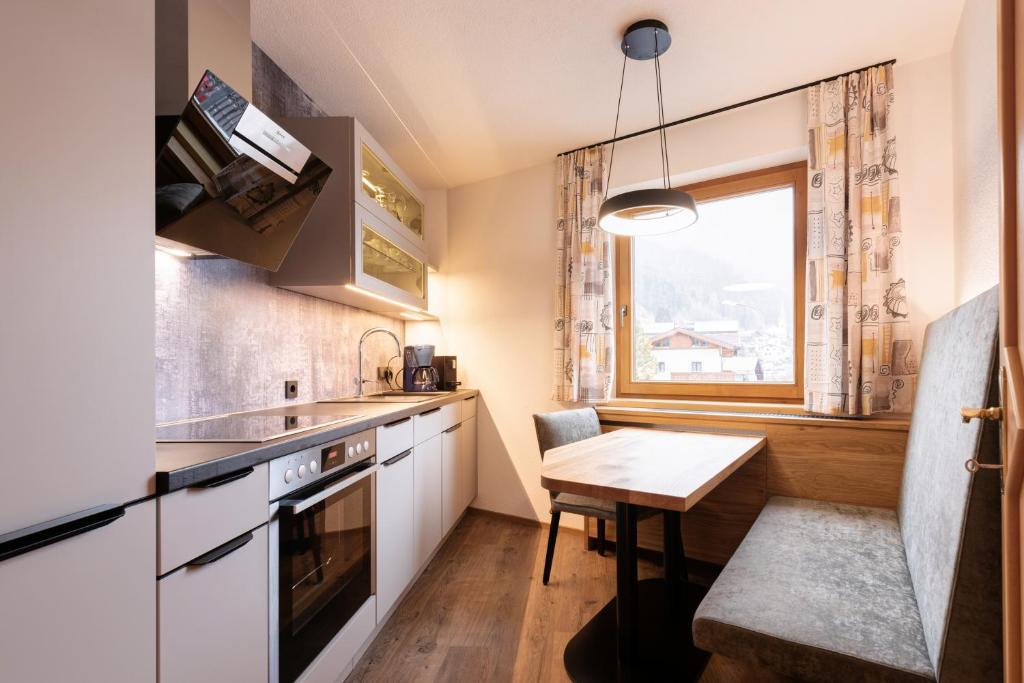 Kuchyň nebo kuchyňský kout v ubytování Hotel Garni Feuerstein