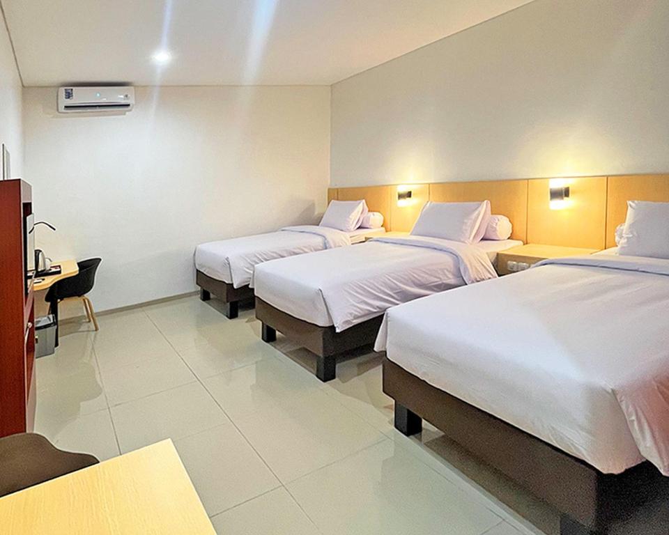 Katil atau katil-katil dalam bilik di Asyana Sentul Bogor