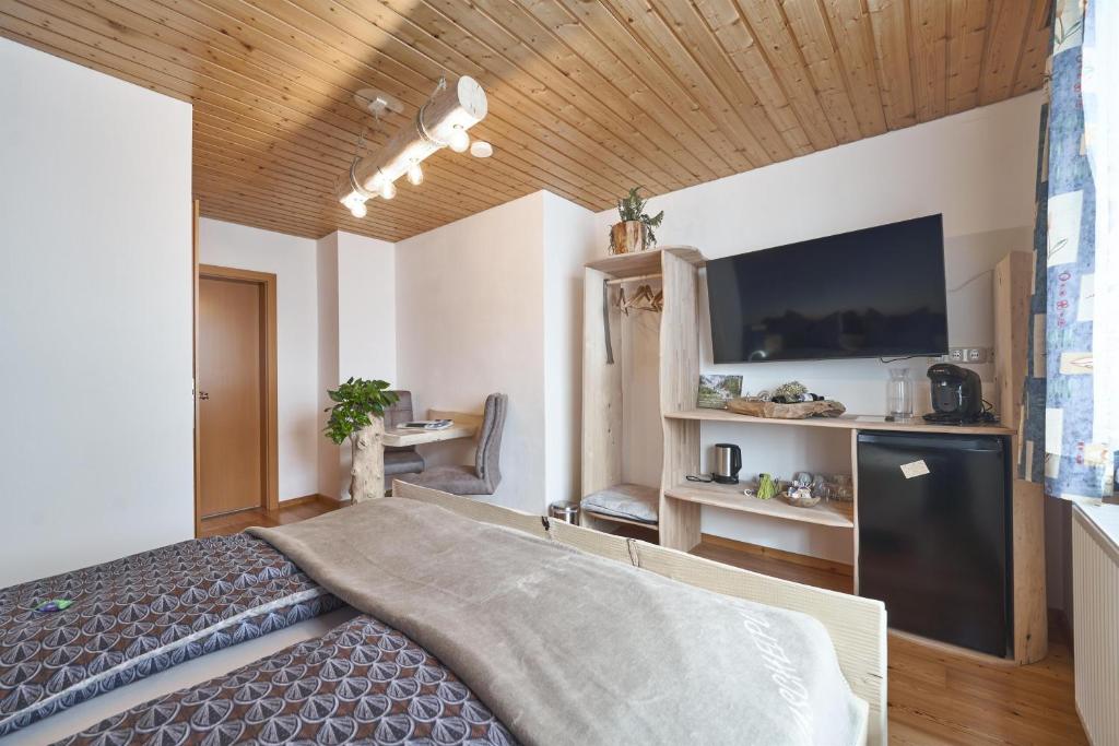 Postel nebo postele na pokoji v ubytování Xeis NeSt