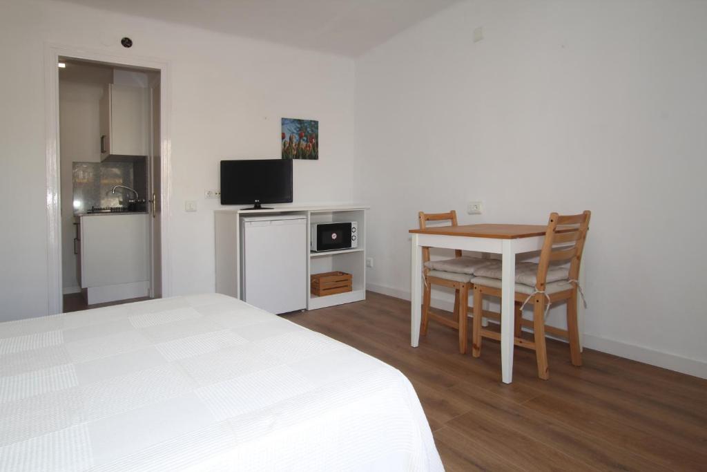 Kuchyňa alebo kuchynka v ubytovaní Apartamentos El Sol II
