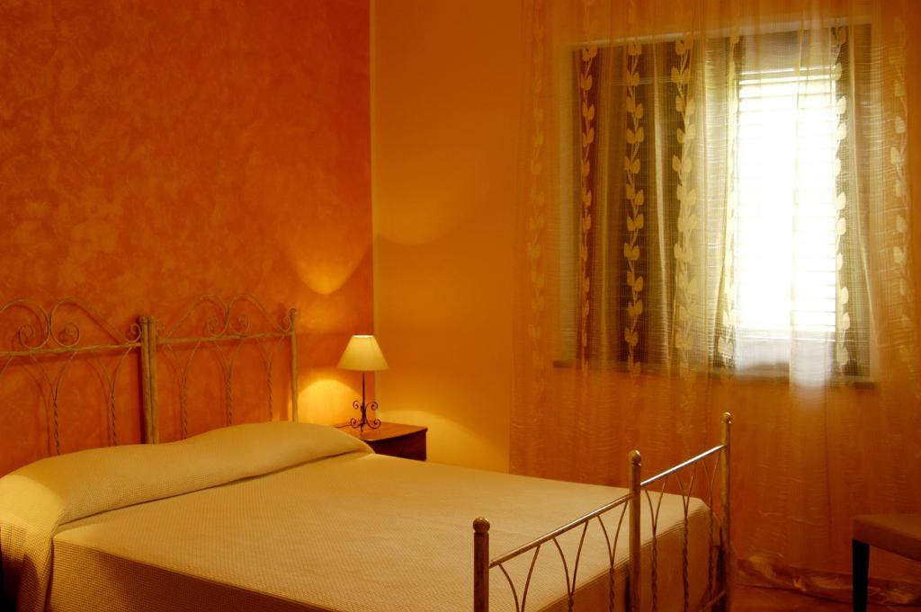 Posteľ alebo postele v izbe v ubytovaní Villa Le Torrette