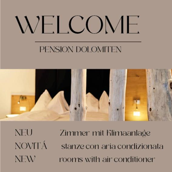 Postel nebo postele na pokoji v ubytování Guesthouse Dolomiten