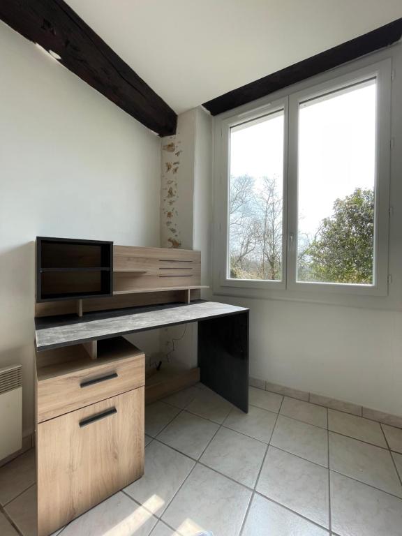 Kuchyňa alebo kuchynka v ubytovaní Le Pyrénéen - L'industriel - Maison Cosy