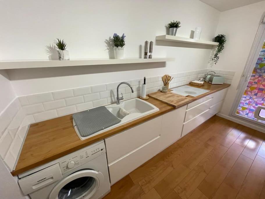 Kuchyňa alebo kuchynka v ubytovaní Appartement Le Della