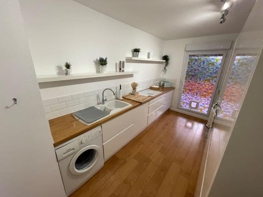 Kuchyňa alebo kuchynka v ubytovaní Appartement Le Della